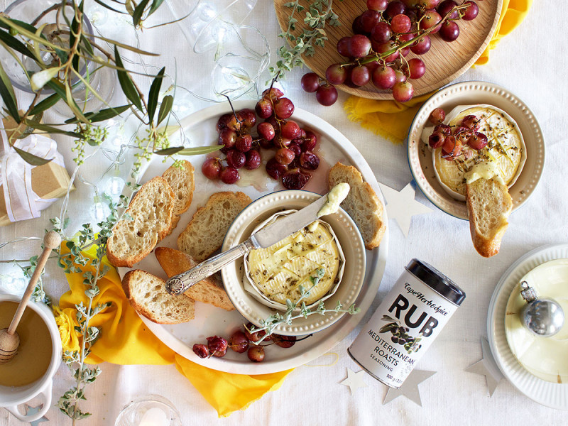 BAKED CAMEMBERT WITH HONEY-ROASTED GRAPES AND CROSTINI